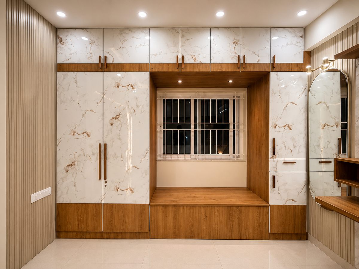Marble-finish wardrobes with a window seat, Bengaluru interior by LuxeMorph Studios