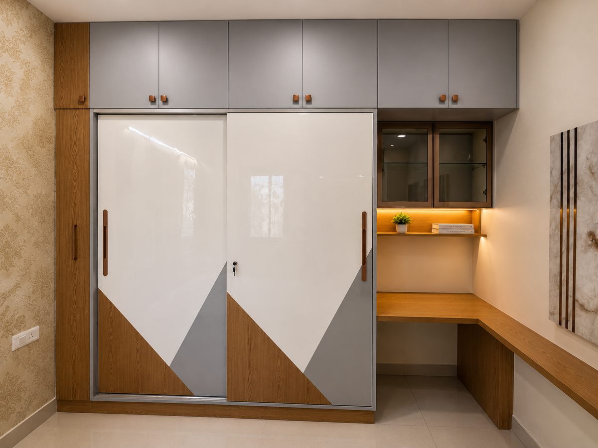 Sliding wardrobe with an integrated study, Bengaluru interior by LuxeMorph Studios