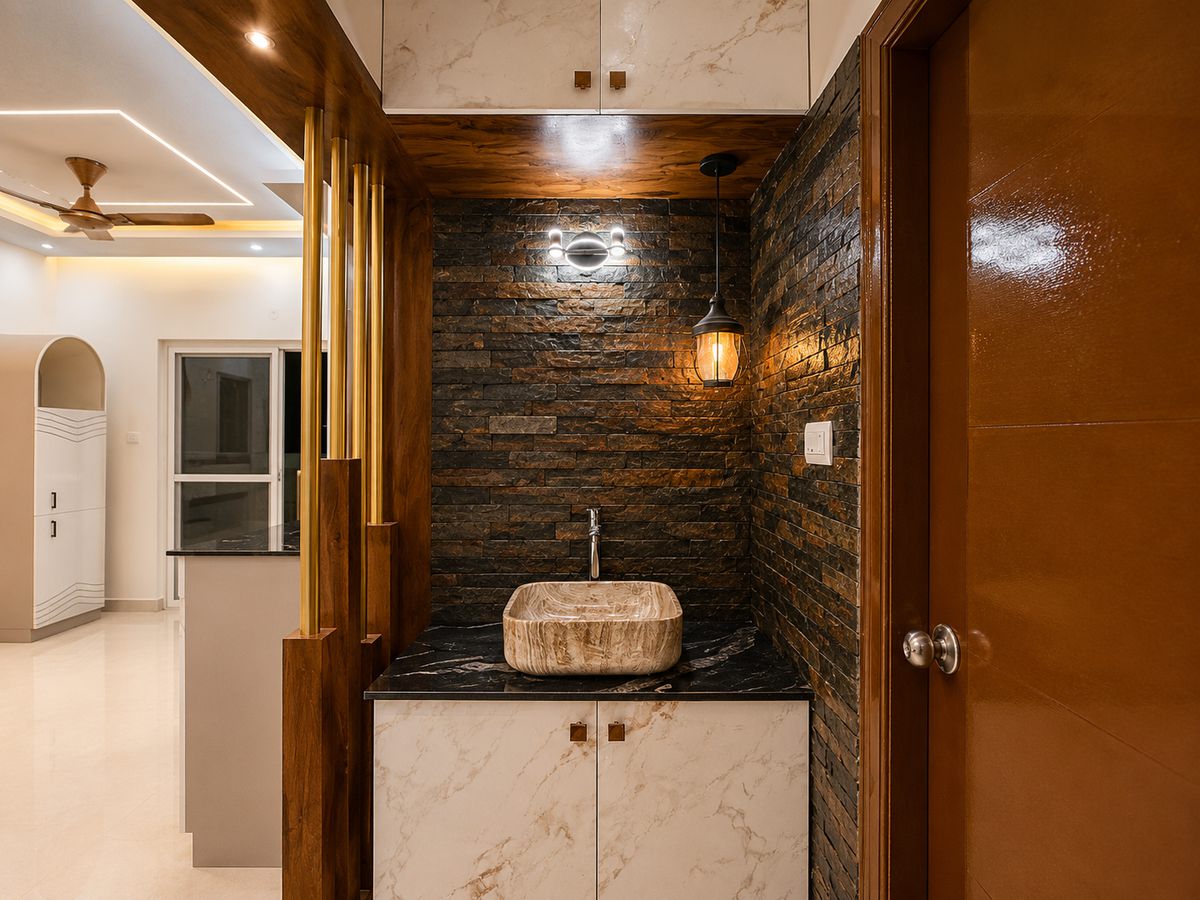 Stone-clad wall with a designer washbasin, Bengaluru interior by LuxeMorph Studios