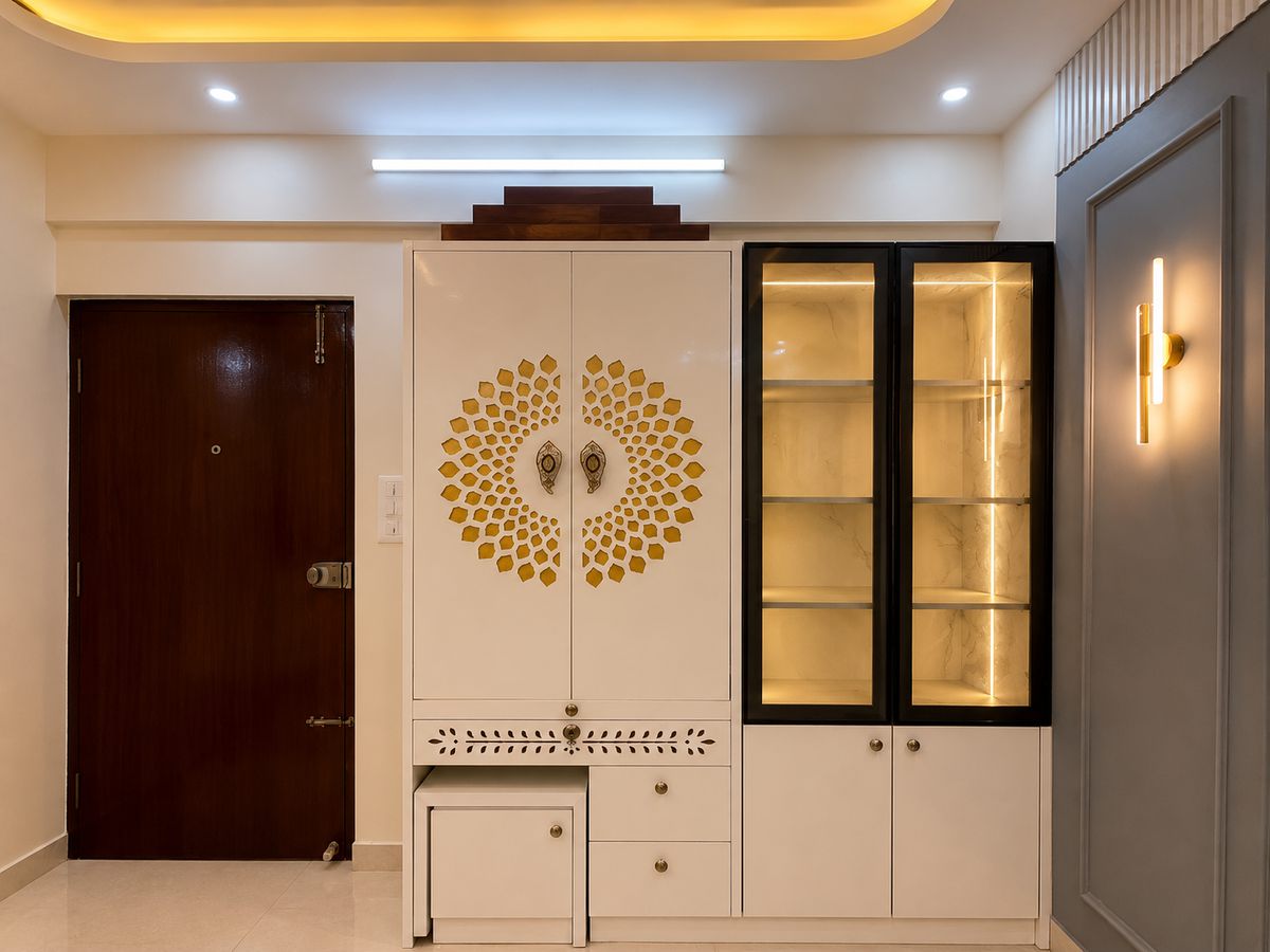 Pooja unit with glass display cabinets, Bengaluru interior by LuxeMorph Studios